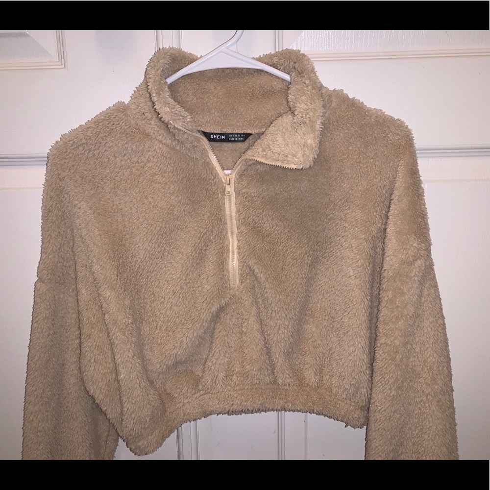 Woman’s Cropped Sherpa Sweater from Shein.